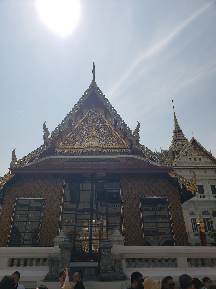 Gold temple gable and a golden chedi at the Grand Palace in Bangkok