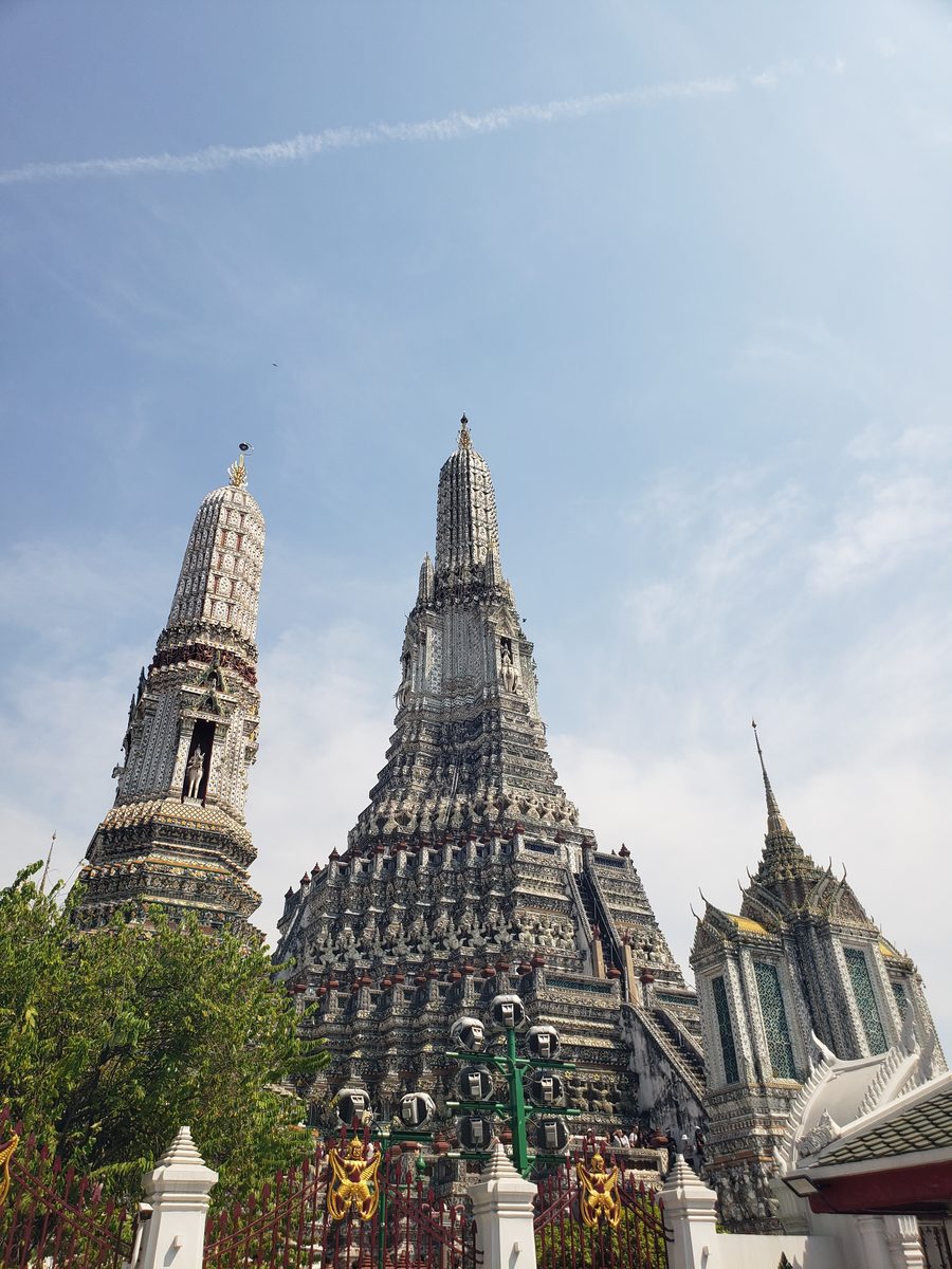 Wat Arun's central prang seen from the courtyard in Bangkok