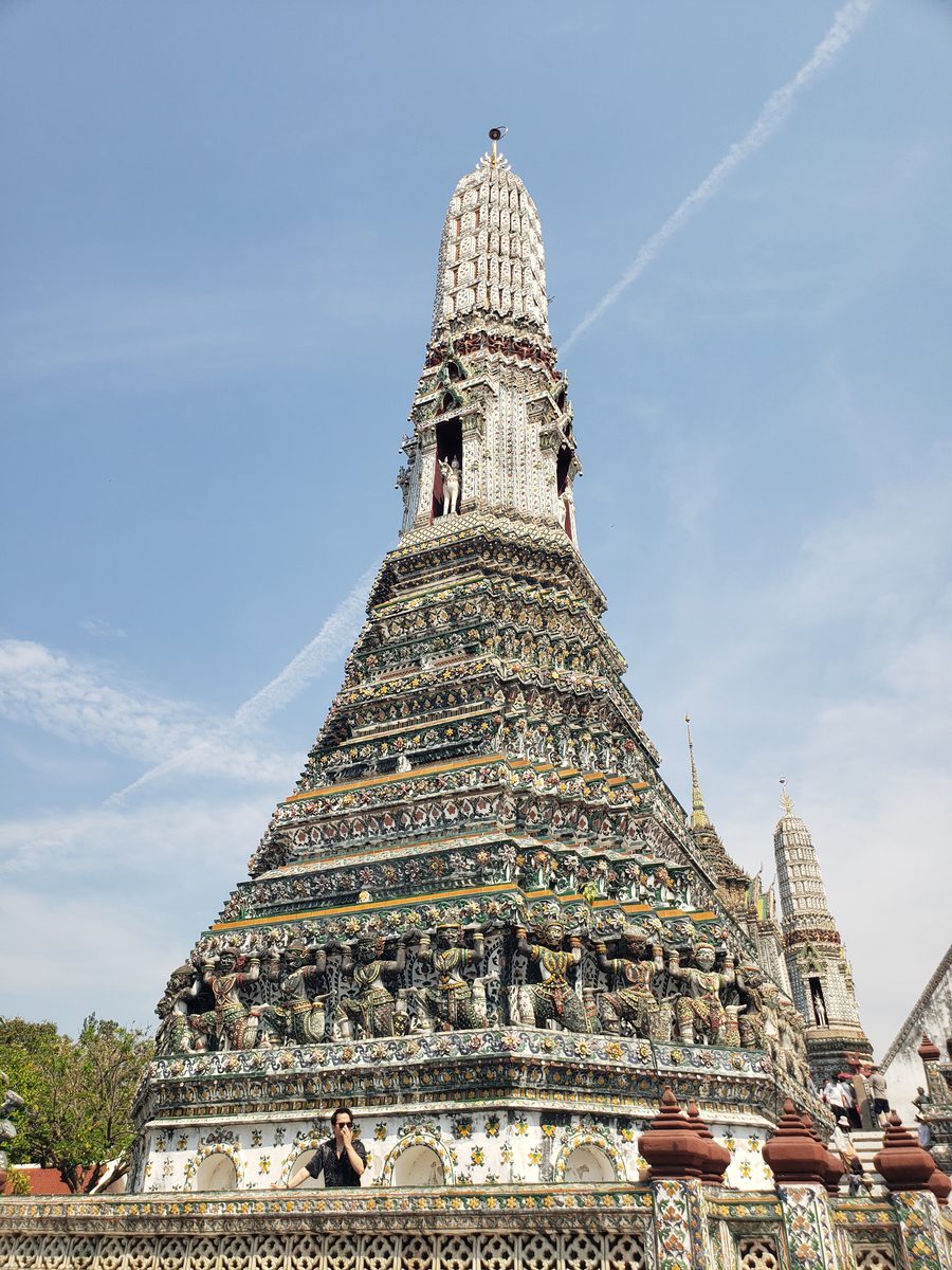 Wat Arun prang with yaksha guardian figures on the lower tier